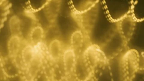 Abstract golden light patterns with soft bokeh effect and blurred background Foto stock