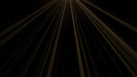 Abstract golden light rays emerging from top center with floating particles.. Видео 343274968