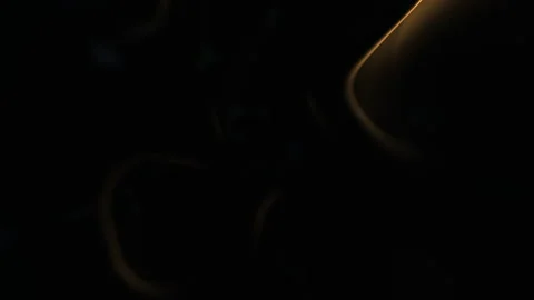 Abstract golden light trails on dark background, glowing motion blur footage Vídeo Stock 330082816