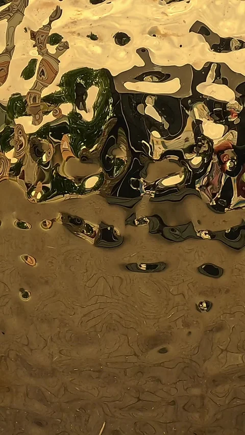 Abstract golden liquid reflection with dynamic ripples Stock Footage 317440407