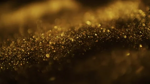 Abstract golden particles on black background Video stock 168222422