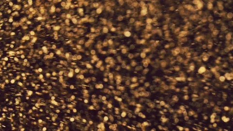 Abstract golden particles with blurred defocused bokeh moves chaos, snow flakes Stock Footage 124379765