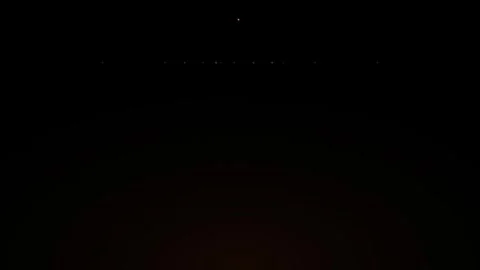 Abstract golden particles floating in dark space motion background, overlay.. 库存影片 344860597