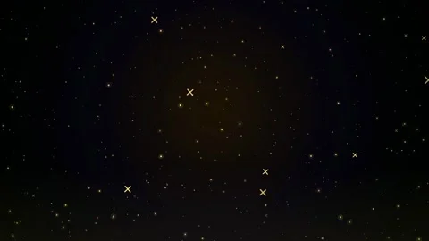 Abstract golden particles floating in a dark cosmic space with a soft central 库存影片 346207346
