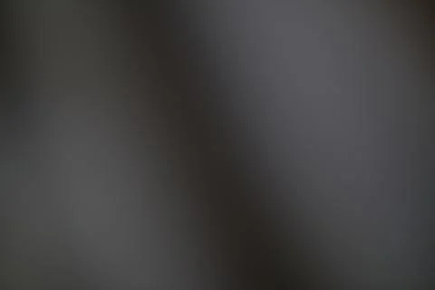 Abstract gradient background with a blend of gray and dark tones Stock Photos