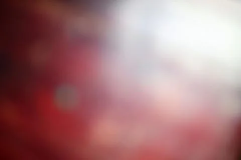 Abstract gradient background in shades of red, white, and pink blending har.. Foto stock