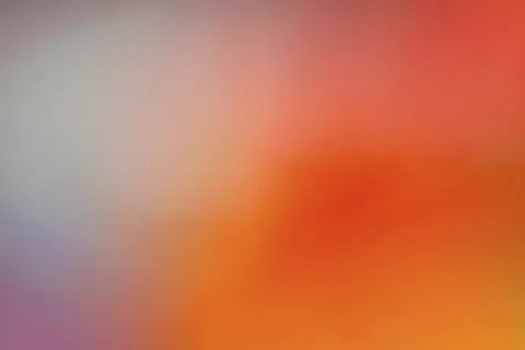 Abstract gradient background of smooth transitioning red orange hues Stock Photos