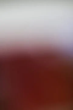 Abstract gradient background with soft transition from white to dark red Stock Photos