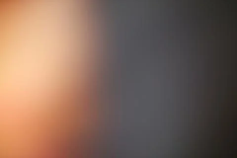 Abstract Gradient Background with Warm Peach to Cool Gray Colors Stock Photos