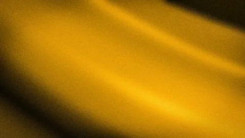 Abstract gradient with deep golden and black hues, featuring a grainy textu.. Stock Photos