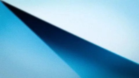 Abstract gradient featuring a vivid mix of soft blues with a bold triangula.. Stock-Illustration
