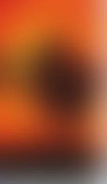 Abstract gradient of warm orange hues fades into deep shadow. Soft textures.. Stock Illustration