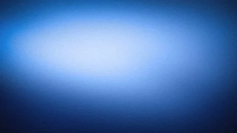 Abstract grainy 4K background with deep blue and soft light blue blurred gr.. Stock Photos