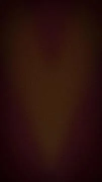Abstract grainy background with a dark vertical gradient of deep chocolate .. Stock Photos