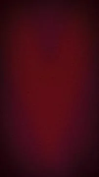 Abstract grainy background with a dark vertical gradient of deep burgundy, .. Stock Photos
