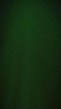 Abstract grainy background with deep dark green gradients and elegant noise.. Stock Photos
