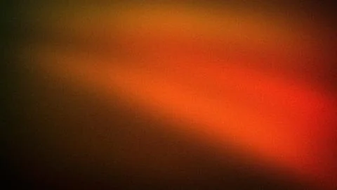 This abstract grainy background features a smooth blur gradient of orange, re Illustrazione stock