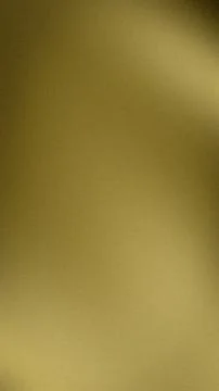 Abstract grainy gold texture background vertical image with gradient blur a.. Stock Photos