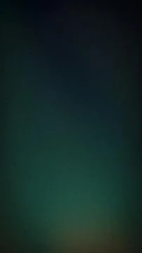 Abstract grainy gradient background with dark emerald green and deep teal hue Stock Photos
