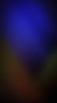 Abstract grainy gradient background with deep blue, navy, dark brown, and b.. Stock Photos