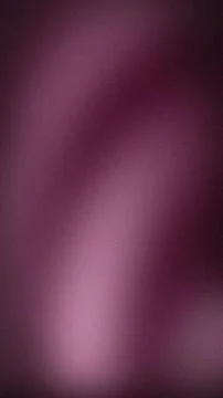 Abstract grainy gradient background with vibrant purple and dark plum tones.. Stock Photos