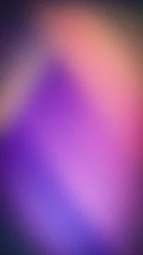 Abstract grainy gradient with soft transitions of purple, pink, orange, and.. Stock Photos