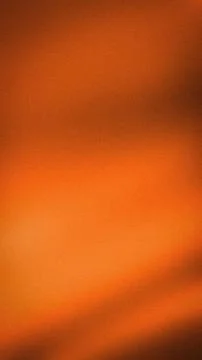 Abstract grainy orange brown gradient background vertical tech wallpaper bl.. Stock Photos