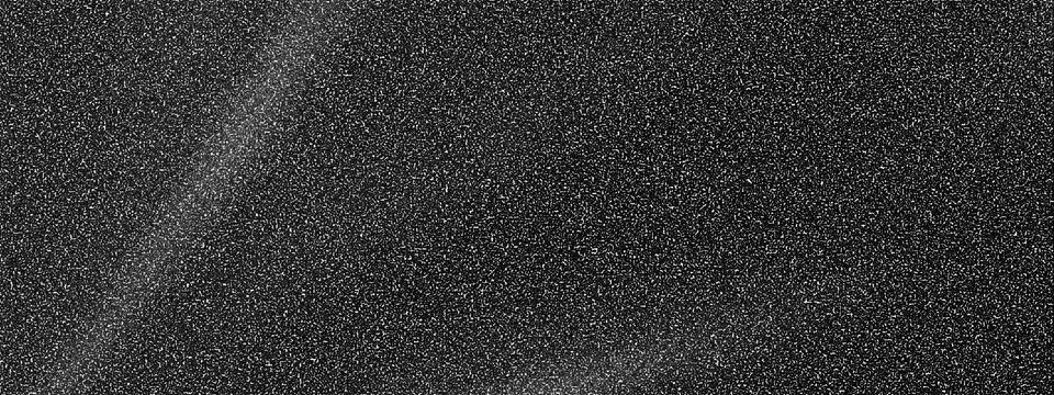 Abstract grainy texture with subtle light streaks resembling cosmic dust or.. Stock Photos