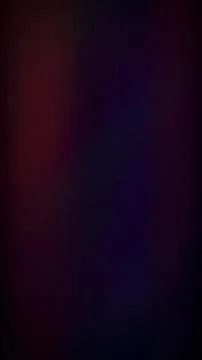 Abstract grainy vertical background with dark purple and deep red moody col.. Stock Photos