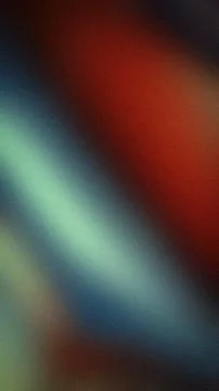 Abstract grainy vertical background with red teal and blue blurred gradient.. Stock Photos