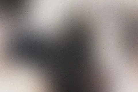 Abstract gray and white gradient background with a subtle grainy texture Foto stock