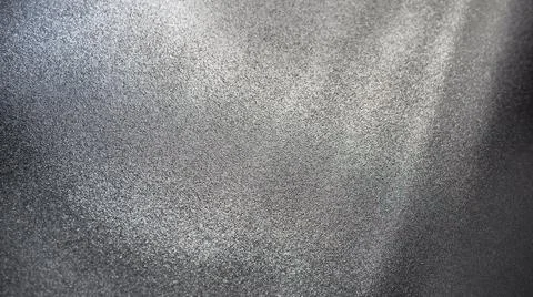 Abstract gray background with gradient, coarse grain. Selective focus. Blurre Stock Photos