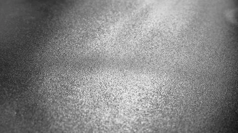 Abstract gray background with gradient, coarse grain. Selective focus. Blurre Stock Photos