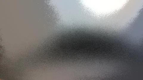 Abstract gray background with gradient, coarse grain. Selective focus. Blurre Stock Photos