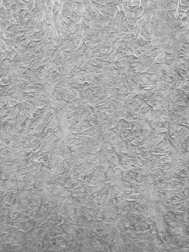 Abstract gray background with a rough, textured surface Stock Photos