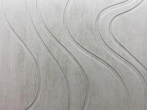 Abstract gray background with smooth flowing curved lines and textured surfac Stock Photos