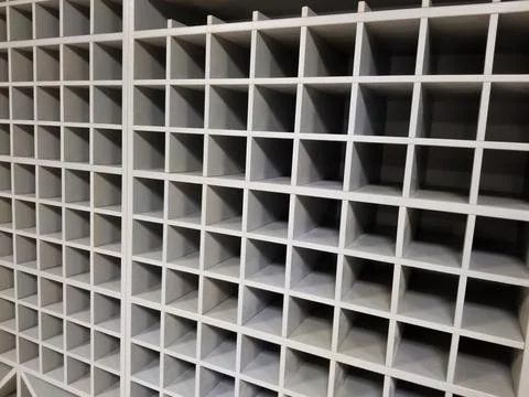 Abstract gray background with three-dimensional squares. Stock Photos