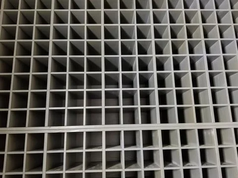 Abstract gray background with three-dimensional squares. Stock Photos