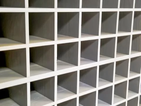 Abstract gray background with three-dimensional squares. Stock Photos