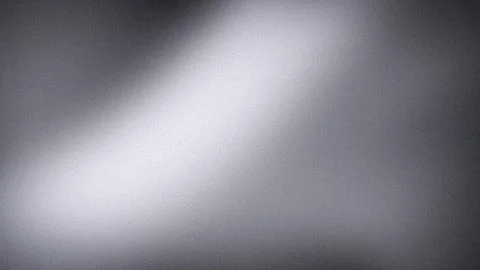 Abstract gray gradient background with light silver white shades and grainy.. Stock Photos