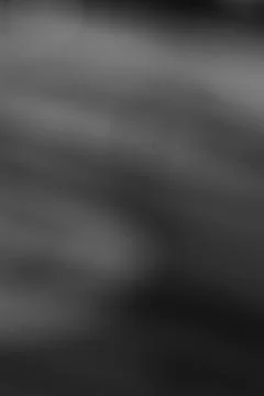 Abstract Gray Gradient Background with Subtle Light Variations Stock Photos