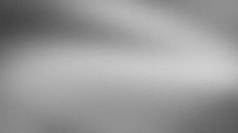 Abstract gray grainy texture background with gradient blur effect 4K digita.. Stock Photos