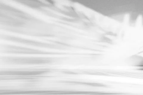 Abstract gray light and shadow overlay creating a minimalist background Stock Photos