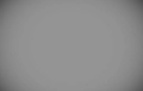 Abstract gray radial gradient is being displayed in flat design, showing subtle Stock Photos