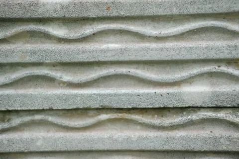 Abstract Gray Stone Texture Weathered Wavy Grooves Create Unique Pattern. Stock Photos