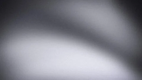 Abstract grayscale gradient background with a grainy texture blur effect in.. Stock Photos