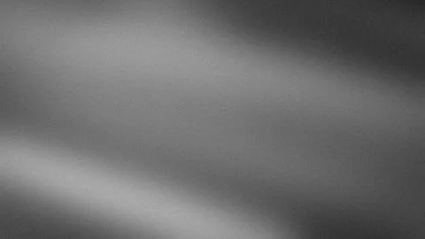 Abstract grayscale gradient background with grainy texture blur and grunge .. Stock Photos