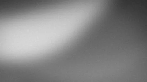 Abstract grayscale gradient background with grainy blur texture perfect for.. Stock Photos