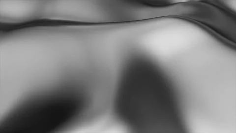 Abstract grayscale image of flowing fabric with subtle light and shadow. Stock Footage 299243947