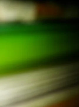 Abstract green background with different blurry elements 写真素材
